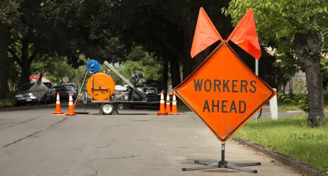 workers ahead sign